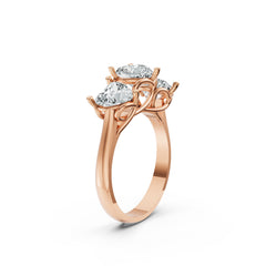 Trilogy Heart Cut Moissanite Diamond Ring in Rose Gold